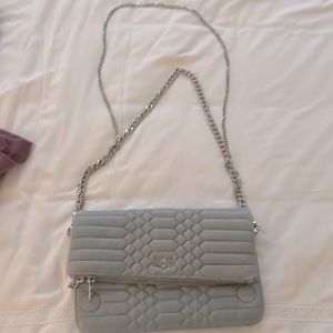 Blue bag used , you can see that it’s used (corner discoloration